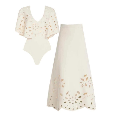 Beachdiva's White Laser Cut Swimwear with Sarong Skirt