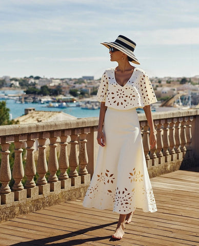 Beachdiva's White Laser Cut Swimwear with Sarong Skirt