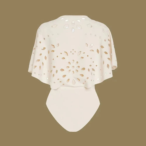 Beachdiva's White Laser Cut Swimwear with Sarong Skirt