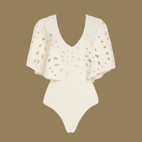 Beachdiva's White Laser Cut Swimwear with Sarong Skirt